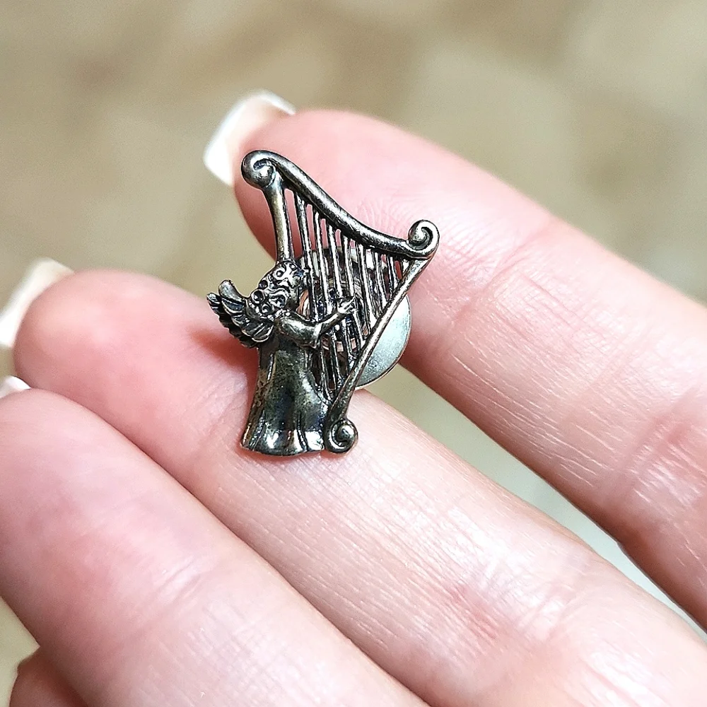 Pair Of Pewter Angel Clutch Pins